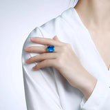 A beautiful ring features a genuine blue topaz stone set in 14K gold-plated solid sterling silver 925, Gemstones Jewelry